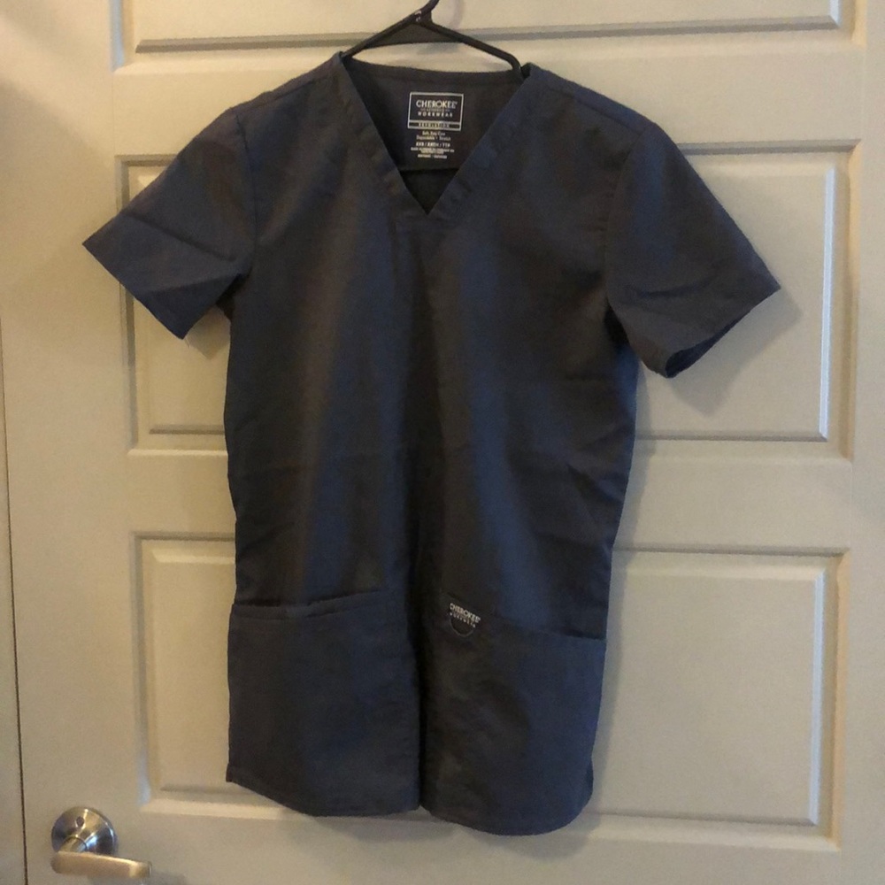 Cherokee Revolution brand scrubs.